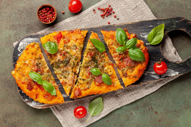 Homemade pizza with tomatoes, mozzarella and basil. Top view Homemade pizza with tomatoes, mozzarella and basil. Top view flatbread stock pictures, royalty-free photos & images