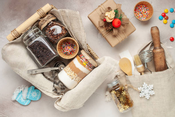 Ingredients for Christmas cookies in a jar on a festive background. Eco friendly or zero waste concept. Top view Ingredients for Christmas cookies in a jar on a festive background. Eco friendly or zero waste concept. Top view baking gift basket stock pictures, royalty-free photos  images