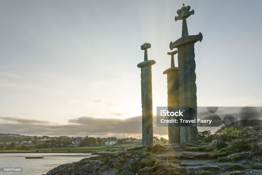 Swords in Rock is a commemorative monument in the Hafrsfjord, Norway. Swords in Rock is a commemorative monument in the Hafrsfjord neighborhood of Madla, a borough of the city of Stavanger in Rogaland, Norway. Stavanger Stock Photo