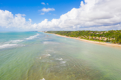 Aerial view of the famous beach Arraial D´Ajuda, next to Porto seguro, the beach is located in a small fisherman village, and has a big coral wall in front of the sand.