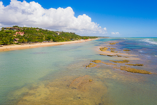 Aerial view of the famous beach Arraial D´Ajuda, next to Porto seguro, the beach is located in a small fisherman village, and has a big coral wall in front of the sand.