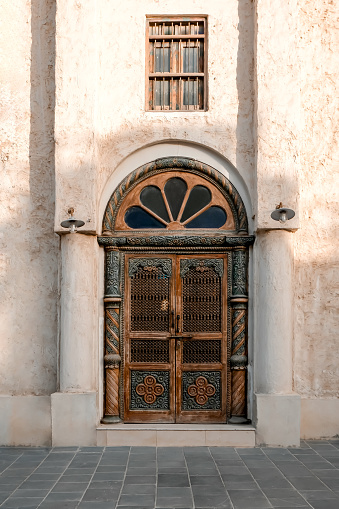 Old door in traditional arabic style with typical arabic ornament