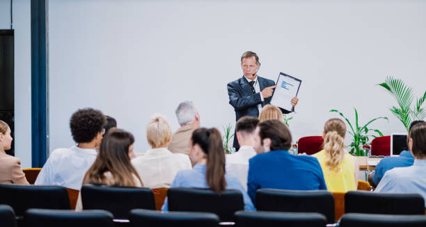 Cinematic image of a conference meeting.