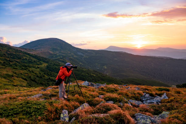 istock Photographer with the tripod 1420781436