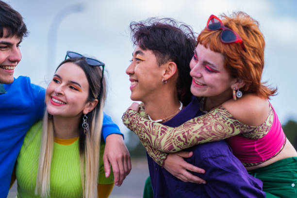 istock Diverse group of friends dressed in colors and makeup 1420786344