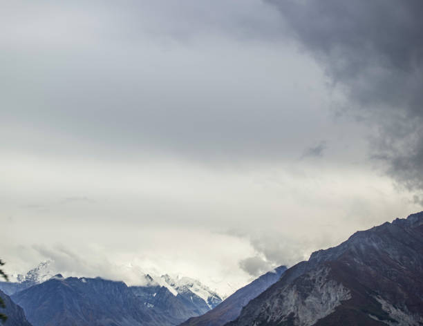 istock Dramatic skies in Alaska with snow capped mountains 1420789869