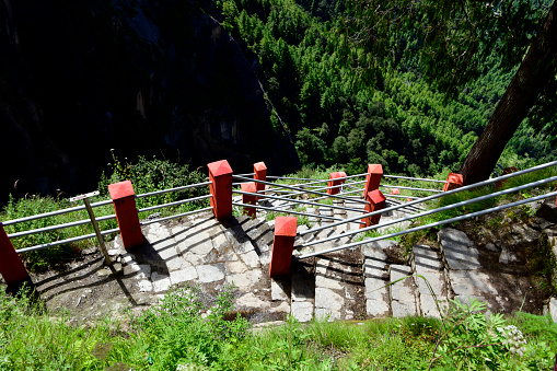 Bhutan: Tiger's Nest - Paro Taktsang / Taktsang Palphug monastery - sacred Vajrayana Himalayan Buddhist site located in the cliffside of the upper Paro valley. The Tiger’s Nest Hike is a 6km trail leading to the monastery located at an altitude of 3120m, it is steep, climbing 900m.