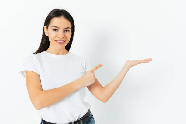 istock Happy confident brunette girl demonstrates something 1420793396