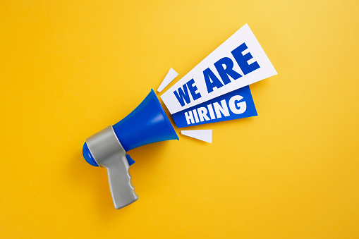 We are hiring announcement message with blue megaphone