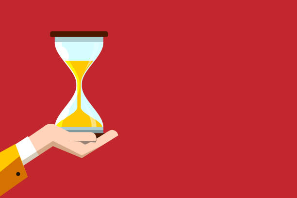 песочное стекло - песочные часы, удерживаемые рукой человека на красном фоне - векторный - sand clock human hand hourglass stock illustrations