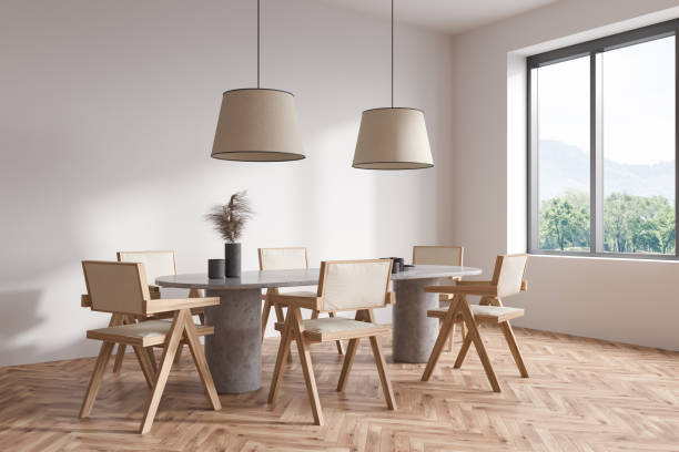 istock Corner view on bright living room interior with dining table 1420801753