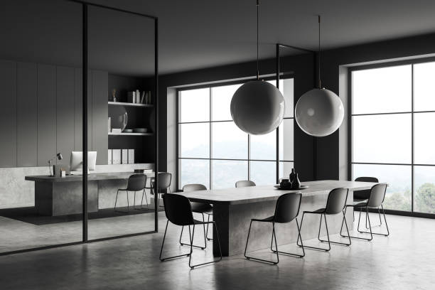 istock Grey business room interior with chairs, table and shelf near panoramic window 1420801901