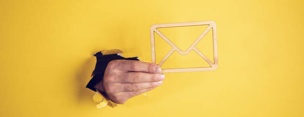 istock Man hand wooden letter sign. 1420803704