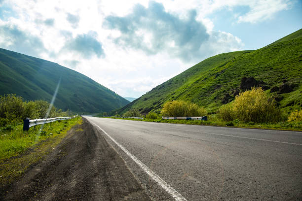 istock Beautiful Summer Mountain Road 1420803869