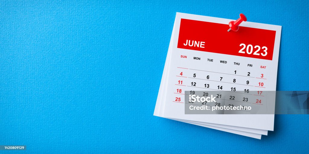 White Sticky Note With 2023 June Calendar And Red Push Pin On Blue Background Calendar Stock Photo