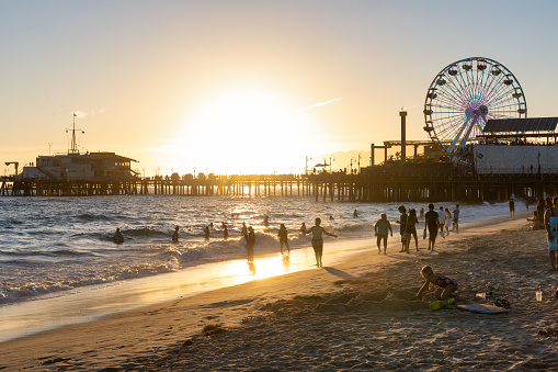 Santa Monica, CA - August 15 2022:  Sunset over the pier in Santa Monica