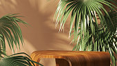 Geometric shape wood pedestal table podium with tropical palm tree leaves on white background