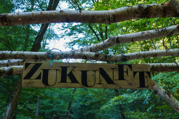 Wooden Board with Word Future german "Zukunft" Symbolic Way forward Future Tomorrow zukunft stock pictures, royalty-free photos & images