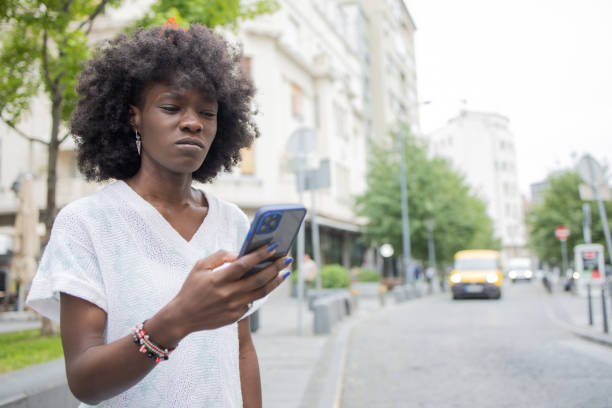istock Happy woman using phone 1420840827