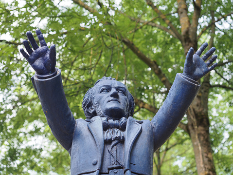 Bayreuth, Germany - Circa June 2022: Blue plastic statue of Siegfried Wagner by sculptor Ottmar Hoerl circa 2013