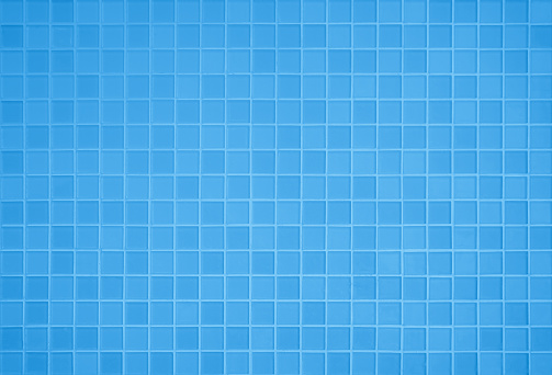 Blue light ceramic wall chequered and floor tiles mosaic background in bathroom, kitchen. Design pattern geometric with grid wallpaper texture decoration pool. Simple seamless abstract surface clean.