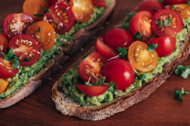 istock Toast with cherry tomatoes and avocado 1420852417