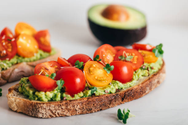 istock Toast with cherry tomatoes and avocado 1420852420