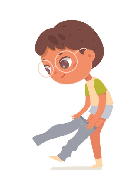 Cute boy putting on jeans, kid with glasses holding jeans to put on before school lessons Cute boy putting on jeans vector illustration. Cartoon isolated independent kid with glasses holding jeans to put on in morning routine before school lessons, child standing with pants in hands boy getting dressed for school stock illustrations