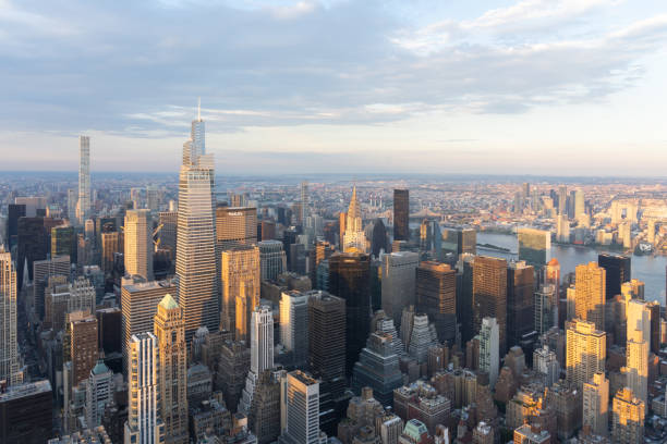 Manhattan skyline view from the top of the Empire State Building looking North East at dusk in New York, NY, USA on August 20, 2022. stock photo