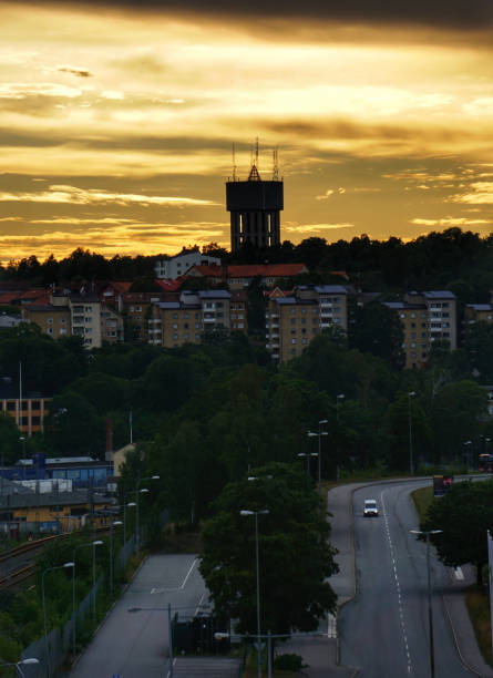 Watertower over city during evening