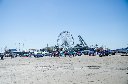 Wildwood beach and amusement park during summer day