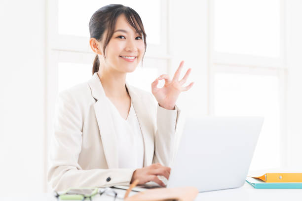 istock young asian businesswoman using laptop 1420866615