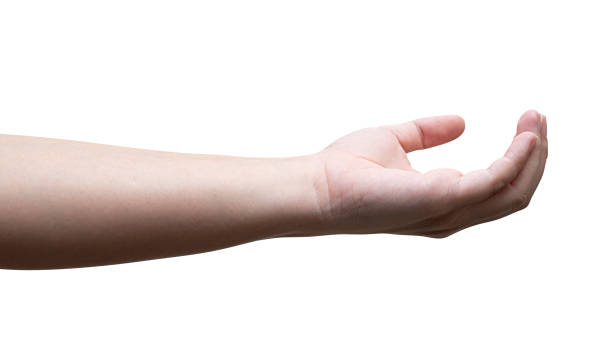 istock isolated of a woman's hand holding something. 1420879683
