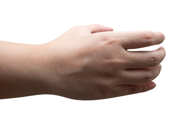 istock isolated of a woman's hand holding something. 1420879946