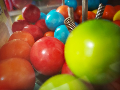 Close Up of Gum balls in a Vending Machine