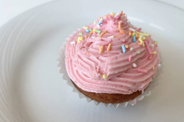 istock delicious ready-to-eat fruity cupcakes on plate 1420891655