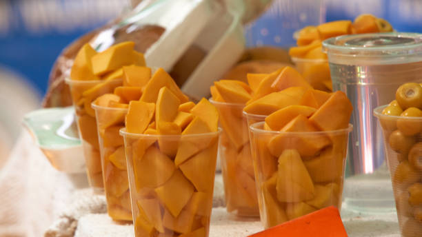 istock glasses with chopped mango sold in the market 1420893168
