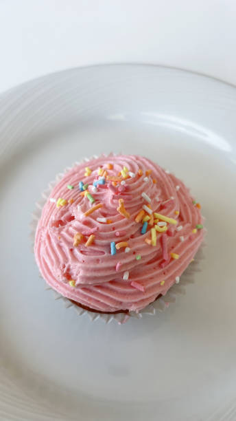 istock delicious ready-to-eat fruity cupcakes on plate 1420893944
