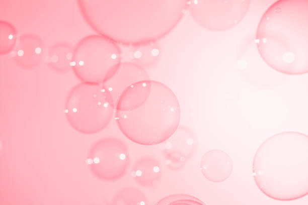 istock Abstract Beautiful Pink Soap Bubbles Background. Soap Sud Bubbles Water. 1420905315