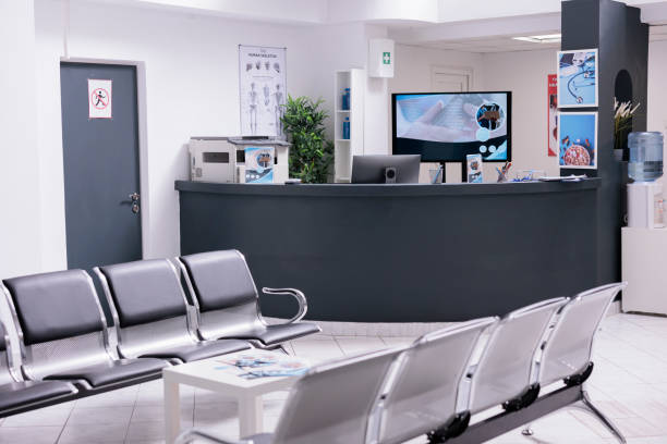 istock Clinical reception with waiting room in lobby 1420906378