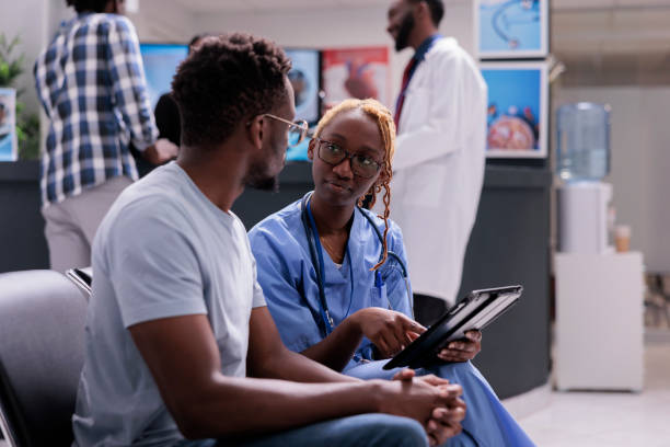 istock African american nurse and patient talking 1420906449