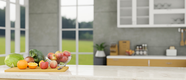 Marble white kitchen countertop with fruits and vegetables on chopping board, copy space for montage your product display over blurred modern kitchen background. close-up 3d rendering, 3d illustration