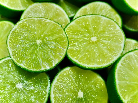 Vegetable and Herb, Close Up of Sliced Fresh and Ripe Lime Fruits.