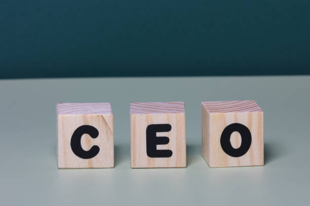 istock CEO word on wooden block  on green background 1420920634