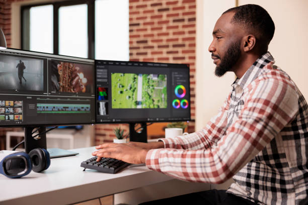 istock Graphic artist editing film footage on software 1420926789