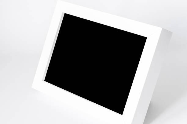 istock white photo frame with black background mockup template 1420929695