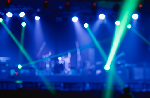 Abstract blurred image background of stage lights. Party, concert and entertainment concept