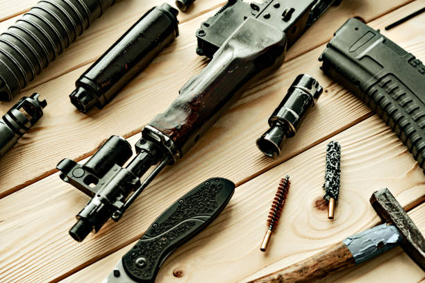 istock Gunsmith's working table for gun cleaning and maintaining 1420932748