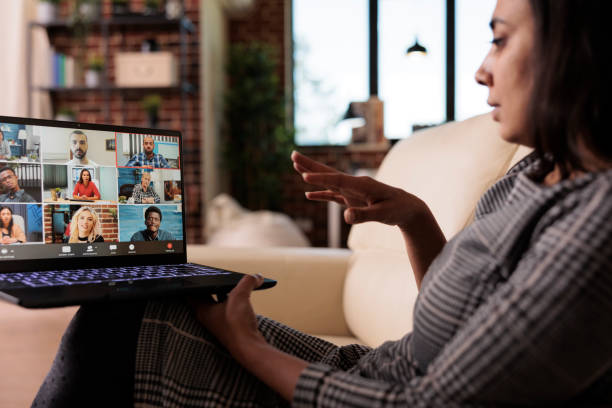 istock Office worker attending online videocall meeting 1420934613