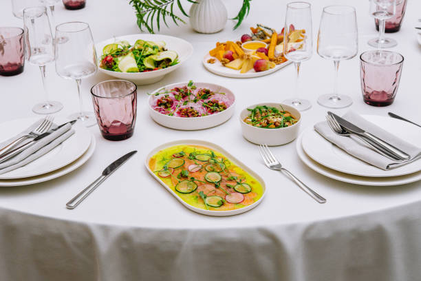 istock Salmon carpaccio and delicious appetizers in a restaurant 1420938412